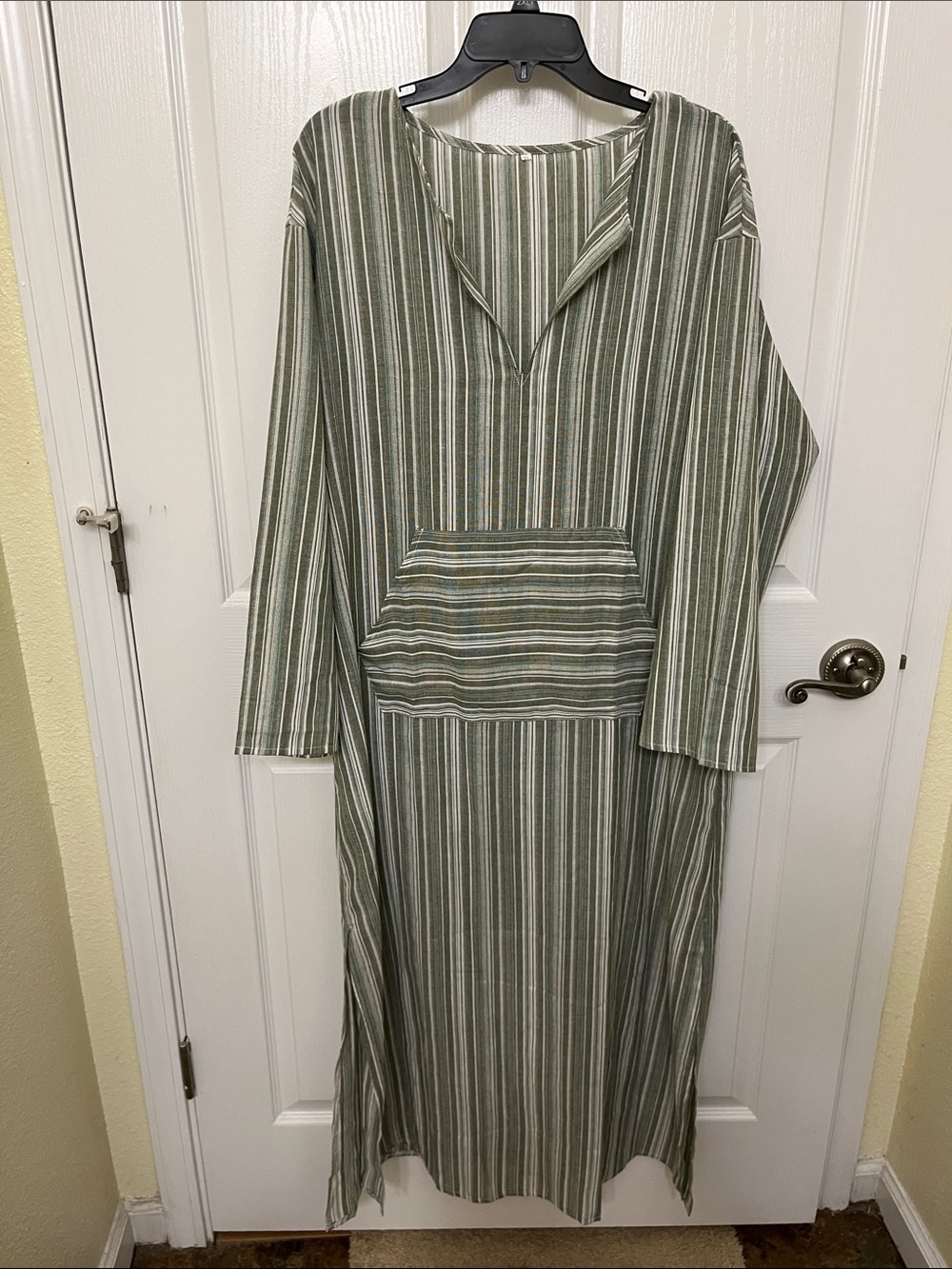 Olive Green Striped Long Sleeve Maxi Dress with Front Pocket. Has slits.